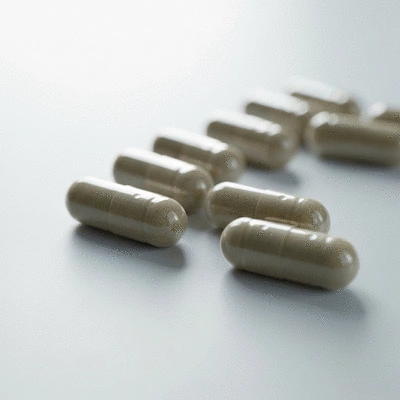 Close-up view of NAD+ supplement capsules in a clean, modern setting